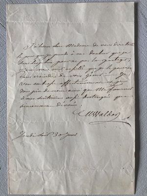 a close up of a piece of paper with writing on it