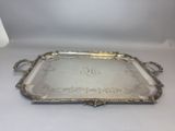 a large silver tray with handles and handles