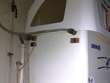 an image of a white boat in a garage