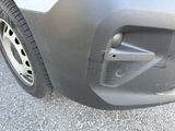 a close up of the front bumper of a car
