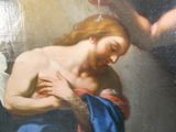 une peinture représentant une femme tenant un bébé sur ses genoux