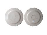 pair of white porcelain plates on a white background with a white background