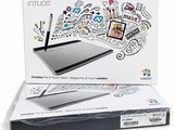 une image représentant une boîte contenant un bloc à dessin et un stylo