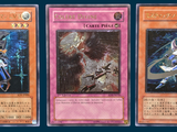 three cards with different designs are shown on a blue background