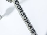 a close up of a metal pole with a sign on it