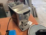 a coffee machine that is sitting on a table