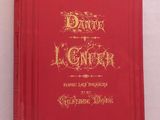 le livre est rouge, avec des lettres dorées dessus