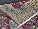 an image of a close up of a rug on the ground