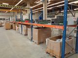 a large warehouse filled with lots of boxes and equipment