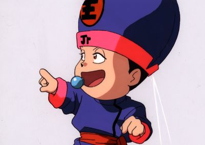 personnage de dessin animé représentant un garçon vêtu d'une tenue bleue et rouge, une brosse à dents dans la bouche