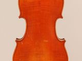an old violin with a wooden back and a long neck