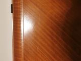an image of a corner cabinet in a bedroom