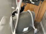 an image of a stationary exercise bike in a room