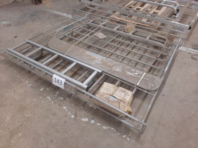 a metal bed frame that has been placed on the floor