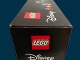 a box that has a lego mickey mouse figure in it