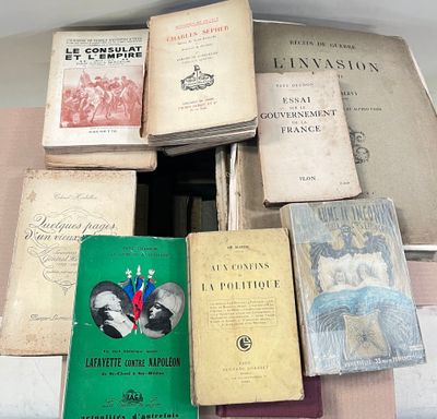 many books that are sitting on top of a table