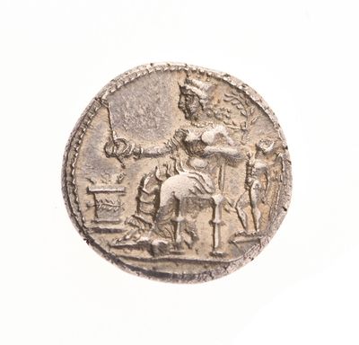 une vieille pièce d'argent représentant une femme à cheval et un homme à cheval