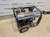a small generator that is sitting on the ground