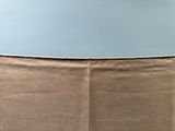 an image of a woman ' s waist with a piece of fabric on it