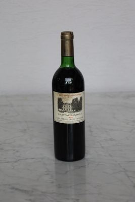 a bottle of wine that is sitting on a table