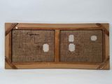 a picture of a wooden frame with a picture on it