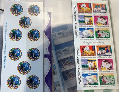 a box of stamps with a picture of the world on it