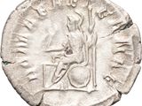 a silver coin with a picture of a man on it