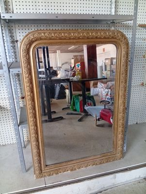 a mirror that is sitting on a shelf in a store