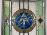a stained glass window with a star on it