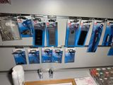 a lot of items that are hanging up on the wall