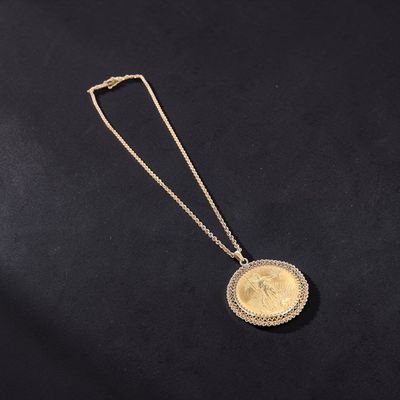 Collier pendentif en or 18K (750e) retenant une pièce 20 dol… - Photo 1