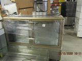 an image of a commercial refrigerator in a warehouse