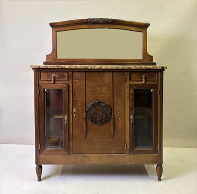 Buffet en bois de placage ouvrant par trois portes dont deux…