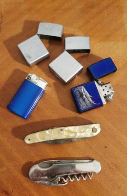 several lighters, lighters, lighter lighters and lighter lighters on a table