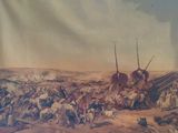un tableau représentant un grand groupe de personnes dans le désert