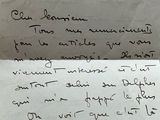 a piece of paper that has a handwritten message on it