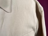 a close up of a shirt and tie on a mannequin mannequin mannequin mannequin mannequin mannequin manne