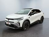un SUV blanc garé dans une pièce au sol noir