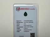 a close up of a piece of jewelry with a tag on it