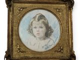 an old picture of a young girl in a gold frame