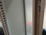 a view of a door from inside a train car