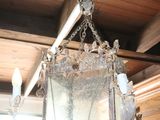 a light hanging from the ceiling in a room