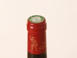 a bottle of wine that is sitting on a table