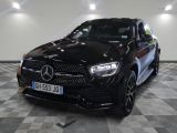 the mercedes gle is parked in a large room with a checkered floor