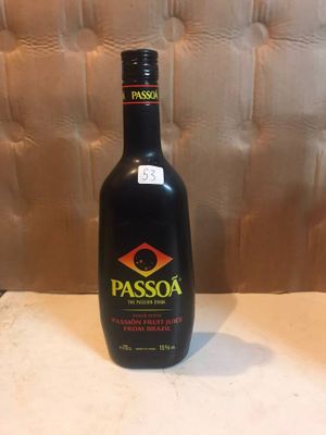 a bottle of passoga wine sitting on a table