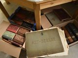 a box full of books sitting on the floor