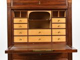 a wooden desk with drawers and drawers on top of it