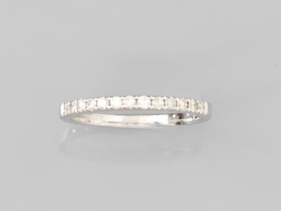 a diamond half - eternity ring, by van cleef