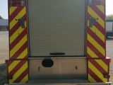 an image of a fire truck parked in a parking lot