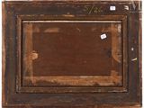 an old wooden picture frame with a tag on it